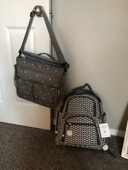 2 brand new diaper bags. Never been used. One is over the shoulder and the other is a backpack.