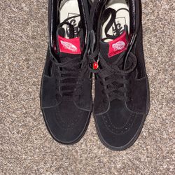 Black Vans Sk8-Hi skate shoes