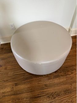 Leather round ottoman