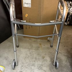 Walker - Foldable and height adjustable