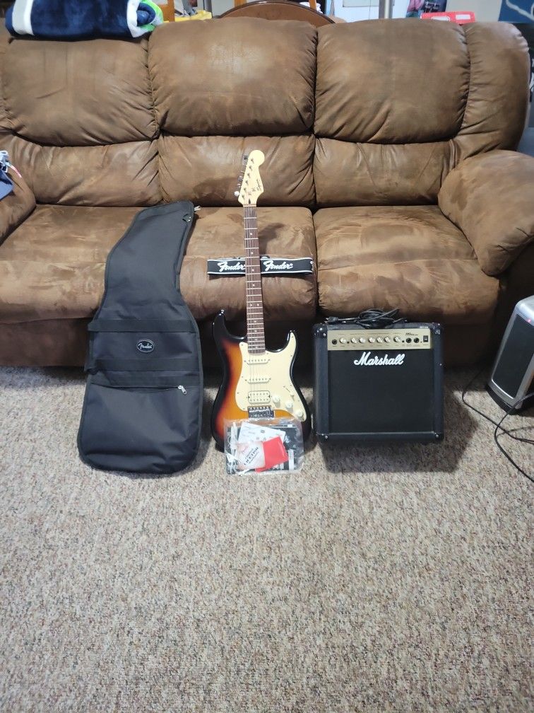 Fender Squire Stratocaster Guitar& Amp