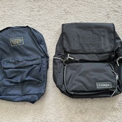 Backpacks, lot of 2, new.  1 premium Outbrook heavy duty vinyl black 18” x 16” with 6 zippered compartments. 1 lightweight National Audubon Society vi