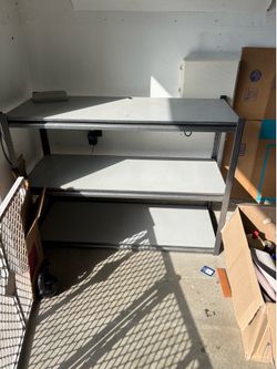 3 sets of metal garage shelves
