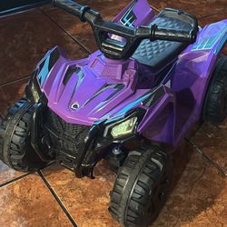 Purple Kids Electric Ride 