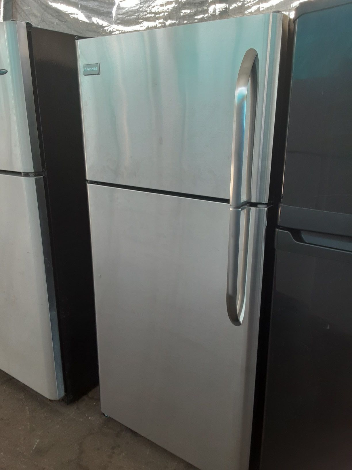 $350 Frigidaire stainless 18 cubic fridge includes delivery in the San Fernando Valley a warranty and installation