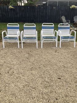 OUTDOOR  CHAIRS -  WHITE & BLUE  VINYL  COLOR - I HAVE 4 - $15  EACH OR $50 IF YOU WANT ALL  4 !!!!!!!