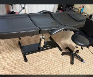 Hydraulic treatment table and stool
