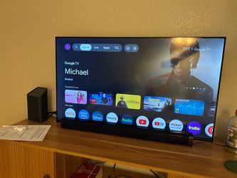 43 inch TCL tv and Sound bar , no tv stand