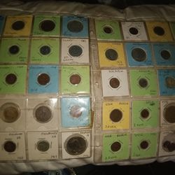 Two Pages Of Various Foreign Currencies 