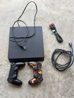 PS4 w/ power cord, 2 controllers, 2 HDMI cables