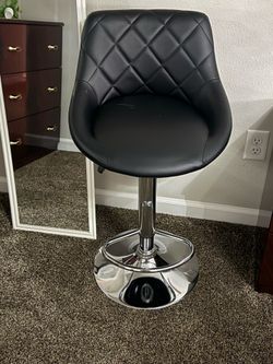 2 black bar chairs