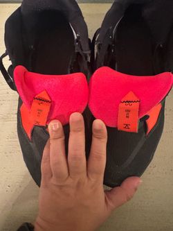 Black and red Nike kyries
