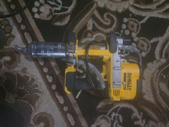 Dewalt 10000 psi. Cordless grease gun like new onely used 3 times still has first tube of grease in