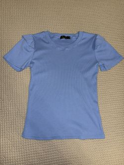 Chic blouse with stylish shoulder fringe detailing