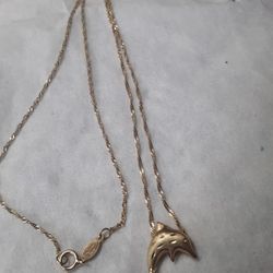 14k Gold Dolphin With Chain.