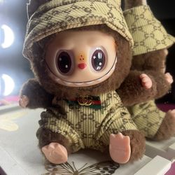 Brown Sit Down La Bu Bu With Clothes 