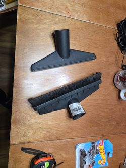 2 Wet dry vacuum attachments.
