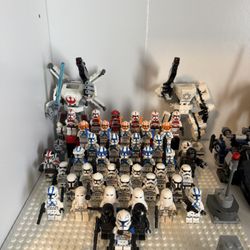 Collection Of Star Wars Legos And Funkos