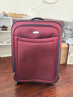 Samsonite red checked luggage