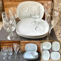 Collection of Goblets Champagne Tulip Glasses and Porcelain Serving Plates