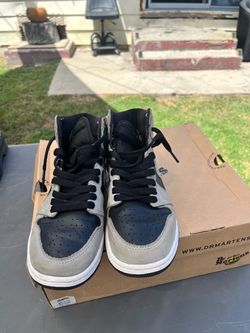 Air Jordan 1 Mid Grey and Black Sneakers