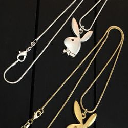 Two 20” Playboy Bunny necklaces (real silver and real gold)