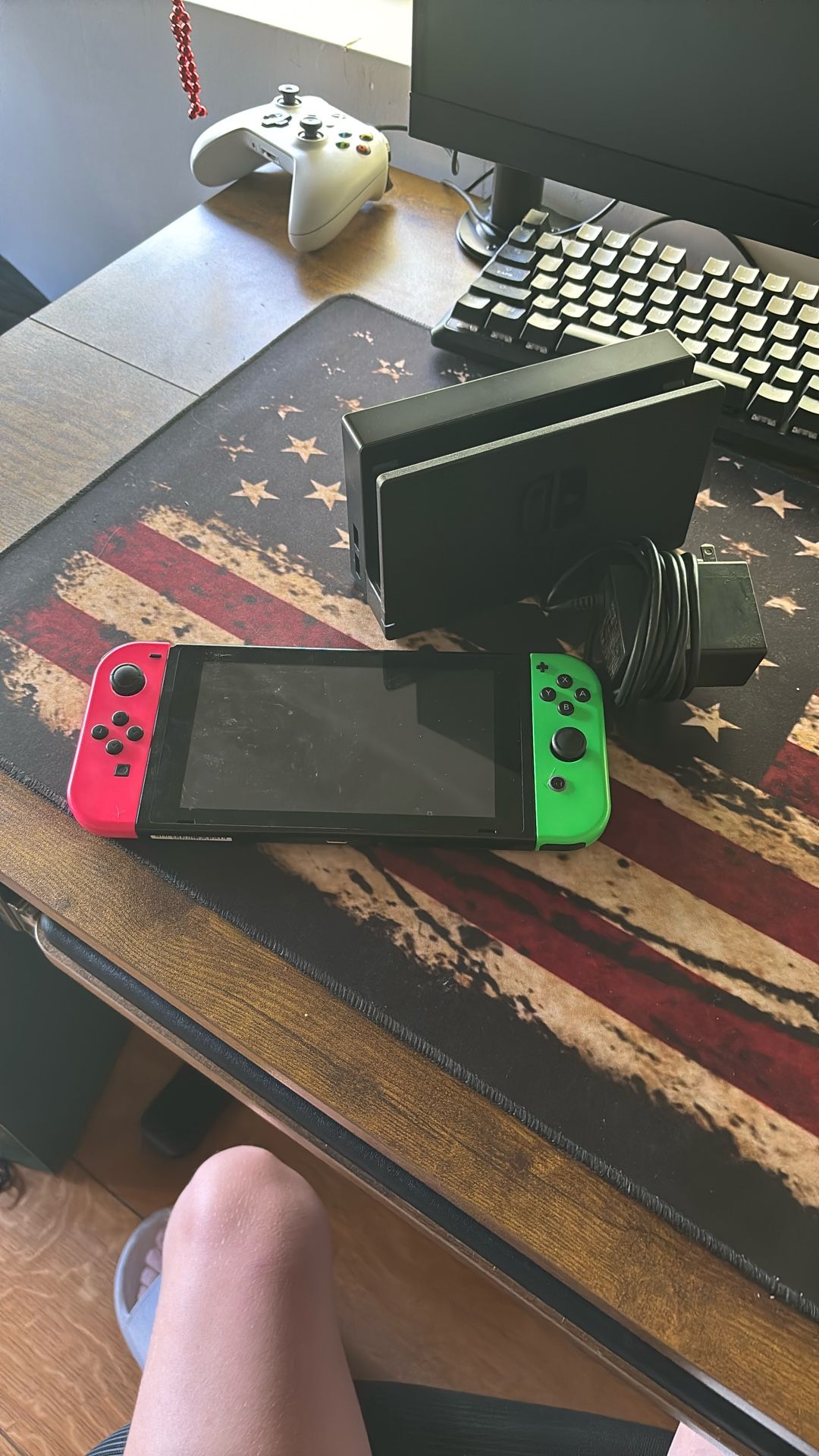 Nintendo Switch, charger, and Dock