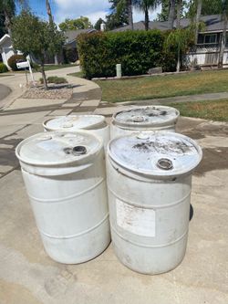 Plastic Barrels Set Of 4 With Lid $ 30.00 For All 4