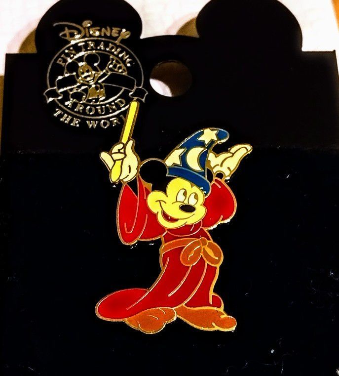 Disney Resort Fantasia Pins featuring Mickey Mouse.
