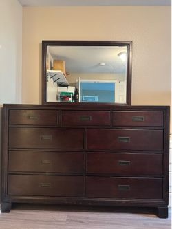 Dark Wood 9-Drawer Dresser with Mirror