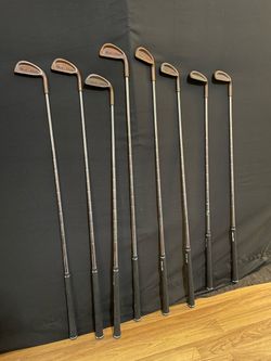 Dunlop RedMax Beryllium Golf Pride golf clubs (9) good cond. as is pick up deliver.