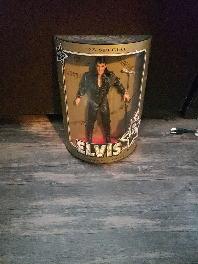 Antique Elvis Doll