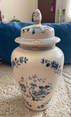 Antique porcelain vase with top