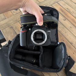 Nikon D3000 Camera, Case, And Charger 