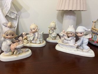 Set of 4 precious moment figurines