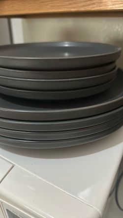 Moving out of state! Selling a set of matte dark gray/charcoal plates from "At Home".