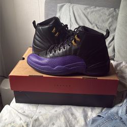 black and purple jordans 12 s  size 10.5
