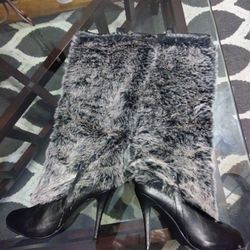 Faux Fur boot heel thr theare size11 but fits like10 never worn