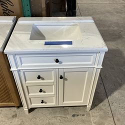 30” Bathroom Vanity in white , single sink soft close solid wood with vanity top in white  $519  Luke’s liquidations warehouse Address:  2434 N Forsyt