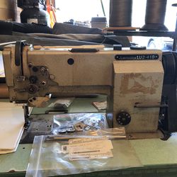 Commercial Sewing Machine And A Lot Of Thread 