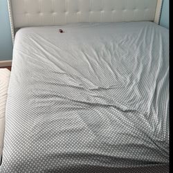 King size bed mattress and bed frame and head frame, mattress is white and the heard frame.