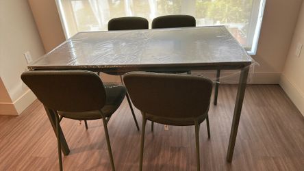 Table and four chairs