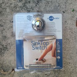 Garbage disposer sink top switch