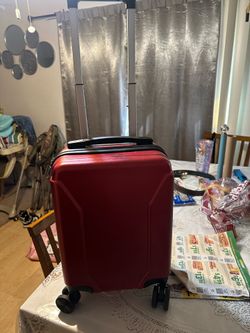 Small luggage and comes with small carry-on inside