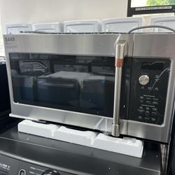 2.1 Cu Ft Over The Range Microwave, Open Box, Comes With One Yr Warranty