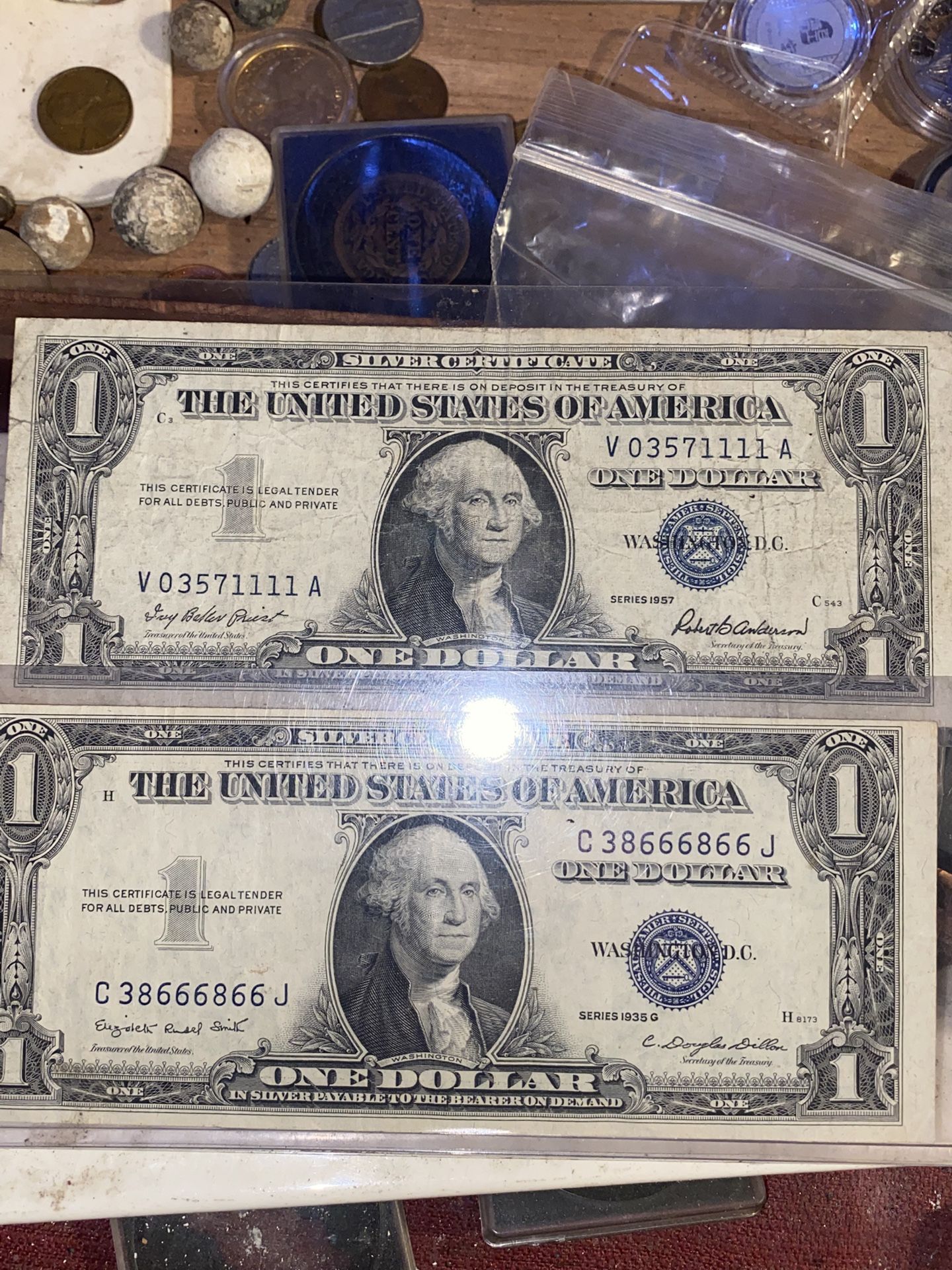 Two individual one dollar silver certificate one is 1935 Z Other 1957