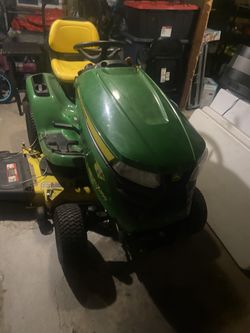 John Deere riding lawnmower