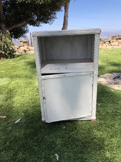 White wicker nightstand