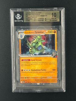 Pokémon Team Rocket’s Tyranitar 096 Cosmos Holo – Beckett Pristine 10