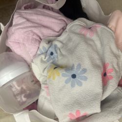 Clothes, baby girl items, purse, and mirrors